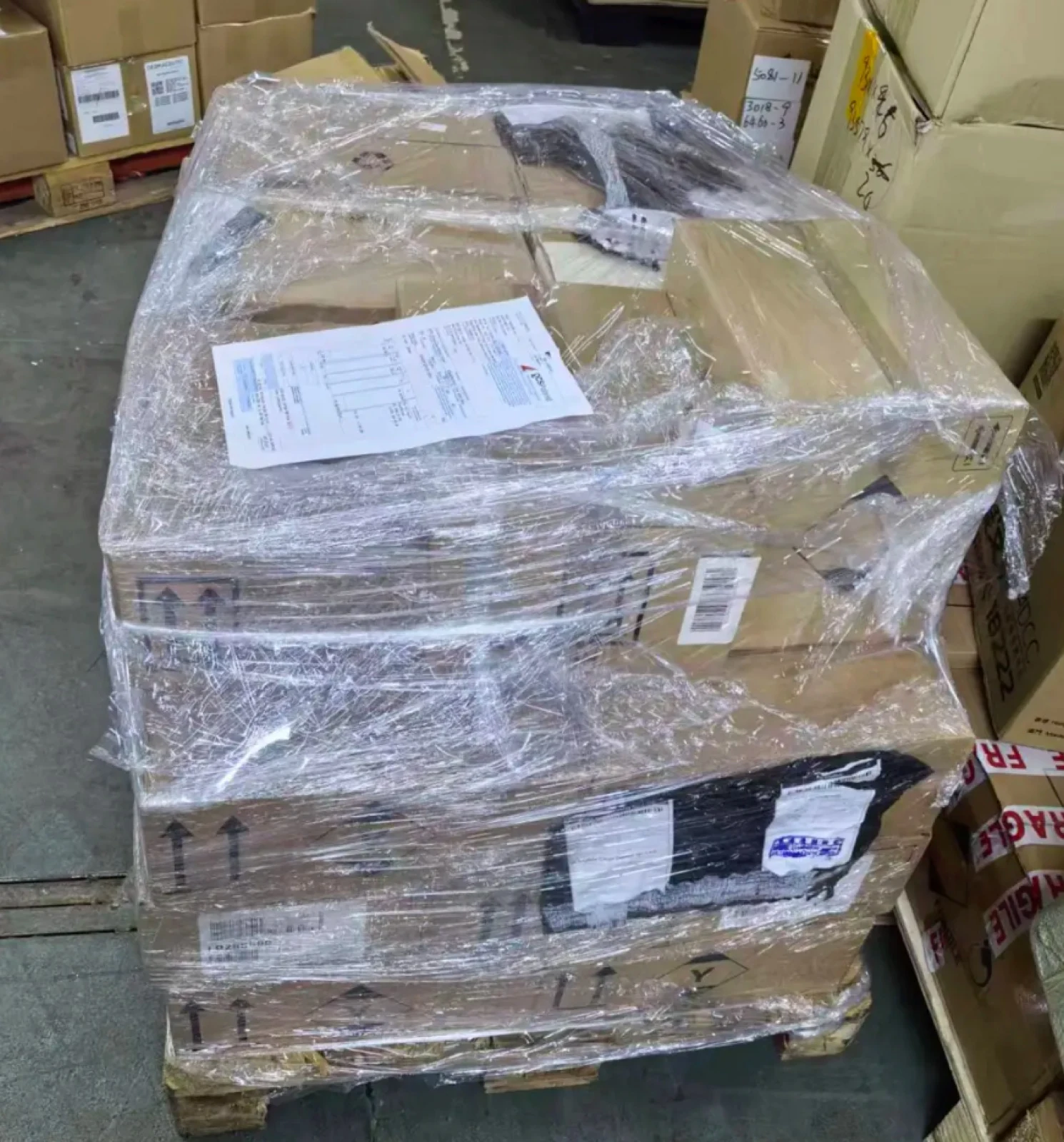 Consolidated cartons secured with stretch wrap on a pallet
